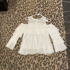 White shoulder-less blouse